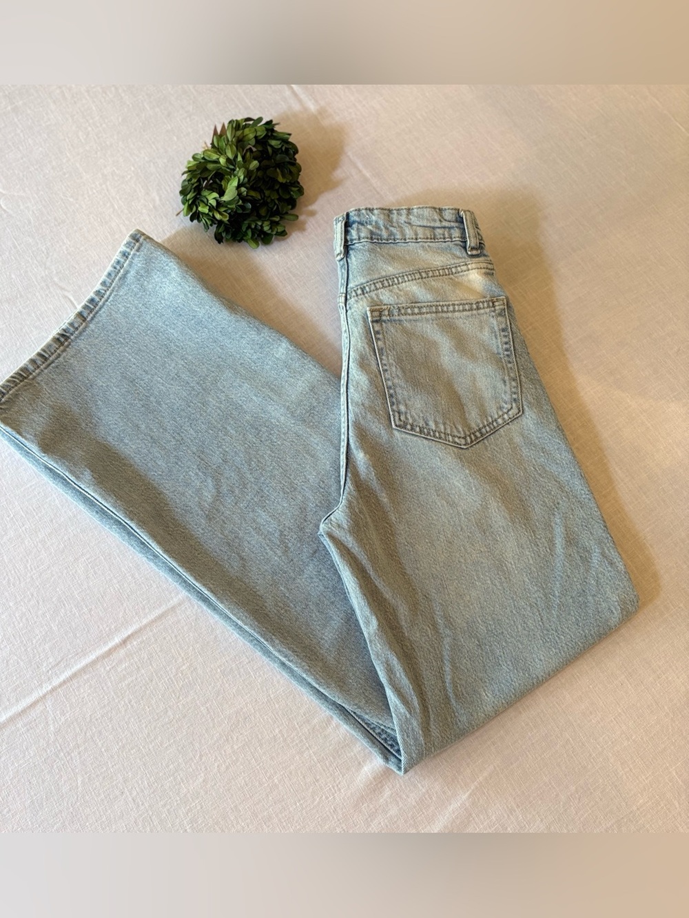 H&M Light Blue High Waist Wide Leg Jeans with bleached accents. Sz 2